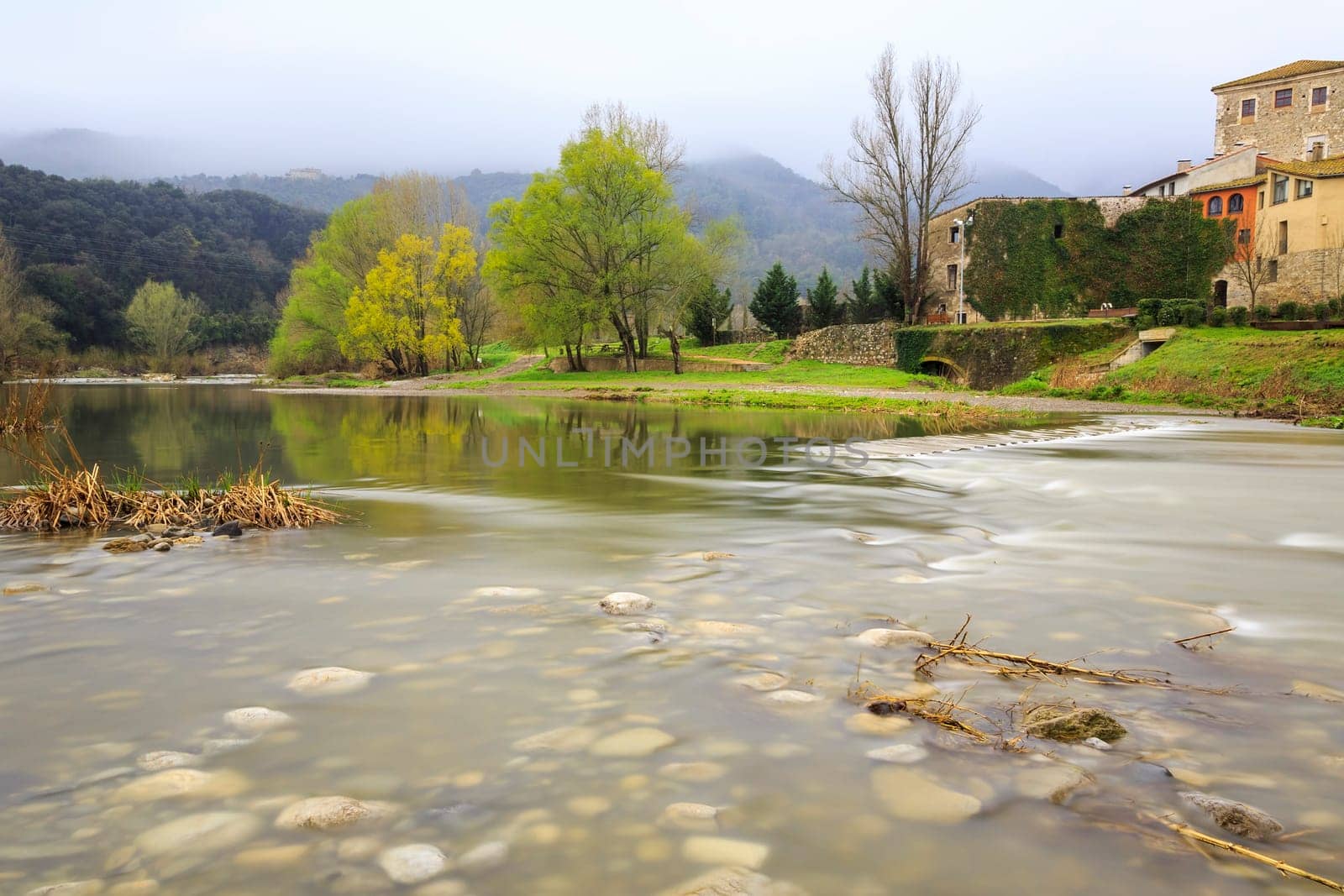 Fluvia river passing through besalu, pretty rural scene Catalan, Spain