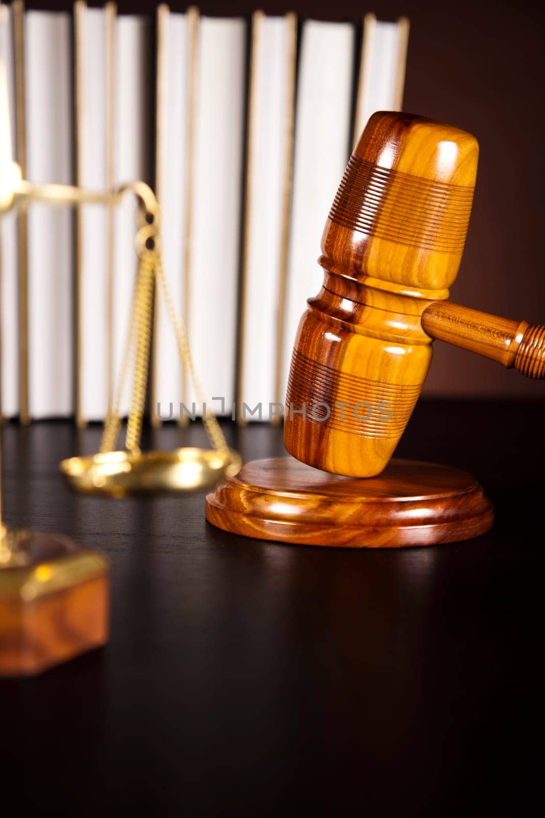 Wooden gavel and books