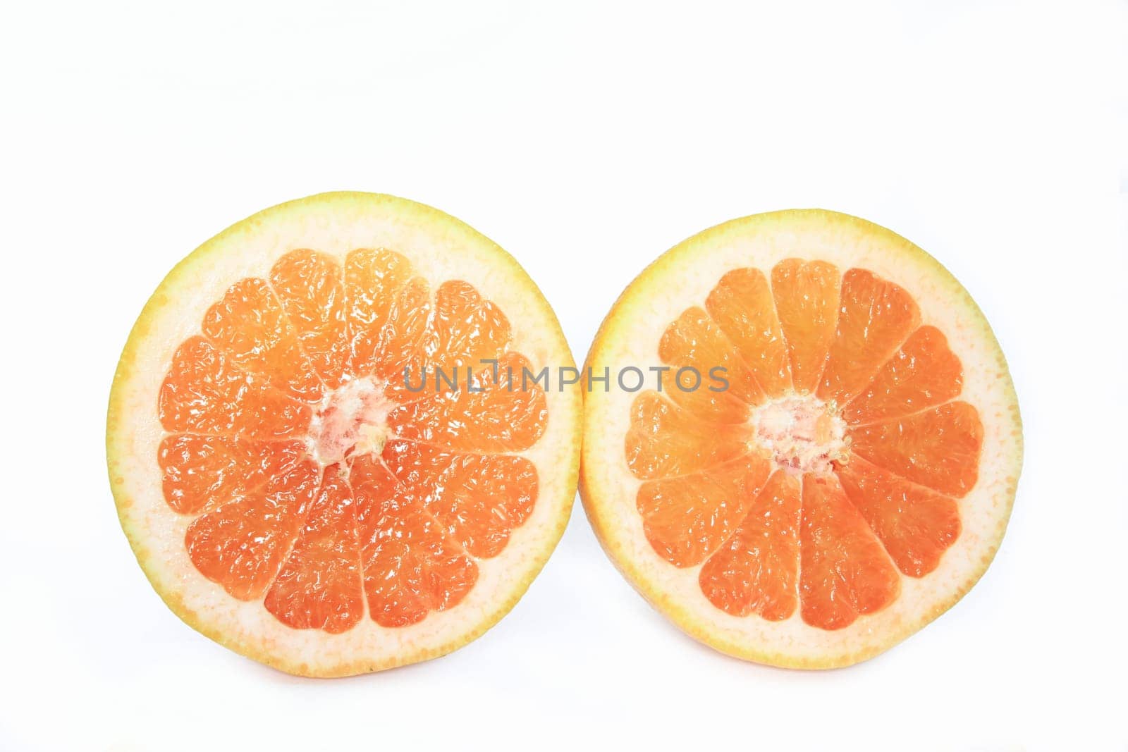 Halved grapefruit,exempt (Citrus x aurantium/ Citrus paradisi)