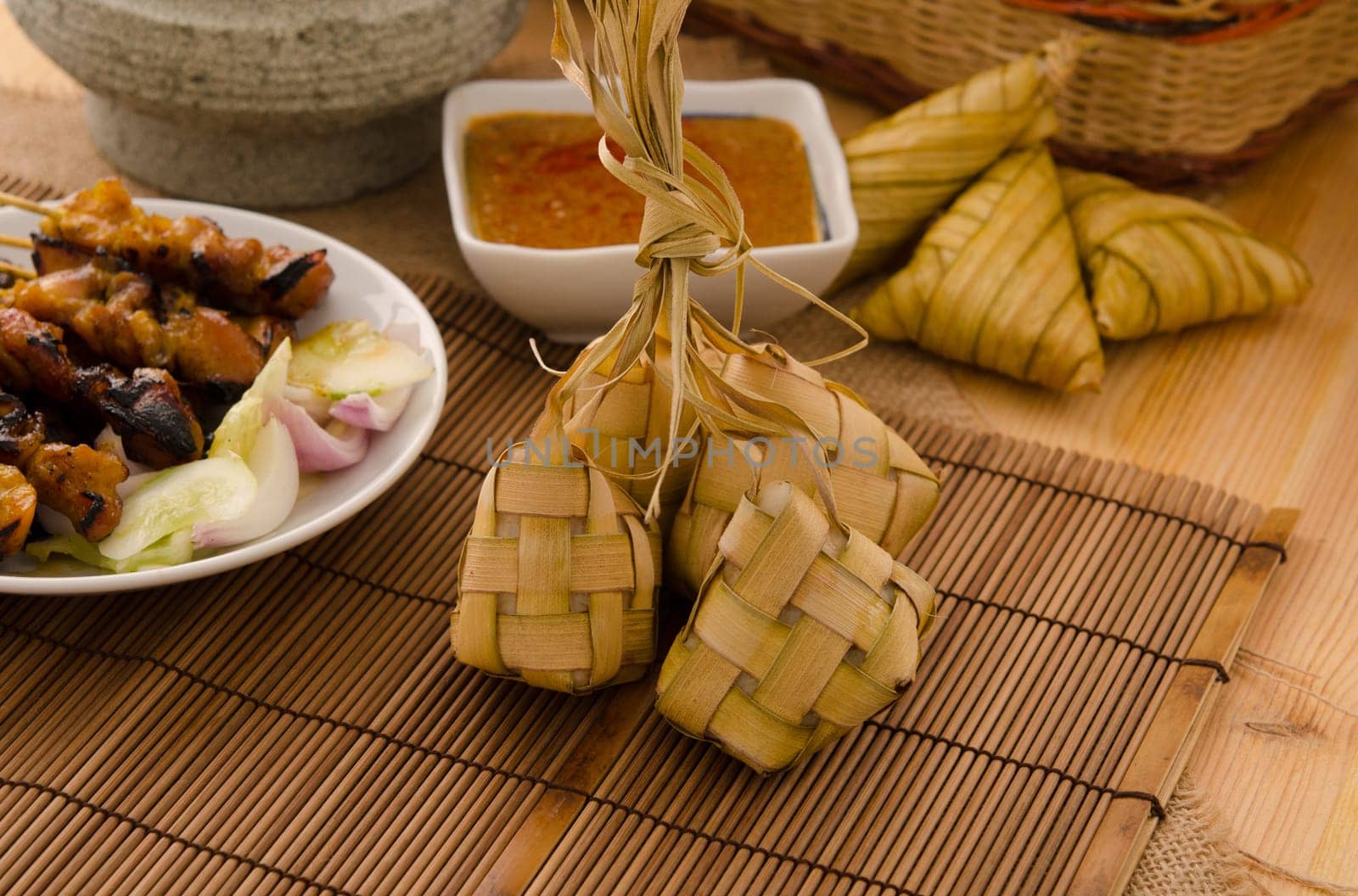 Ketupat: South East Asian rice cakes bundle, often prepared for festivities and celebratory occasions.