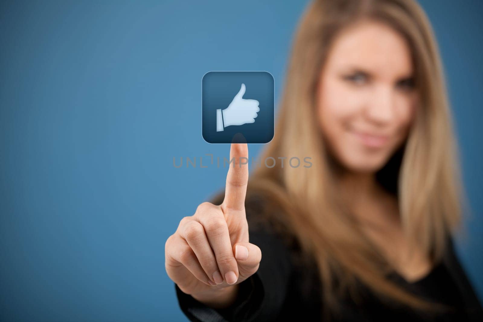 Social media concept. Young woman click on the like button.