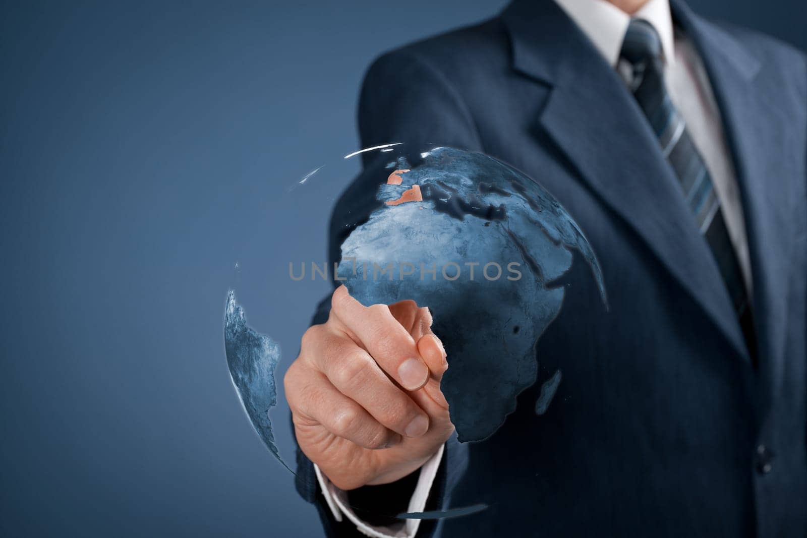 Man click on Europe on virtual globe.