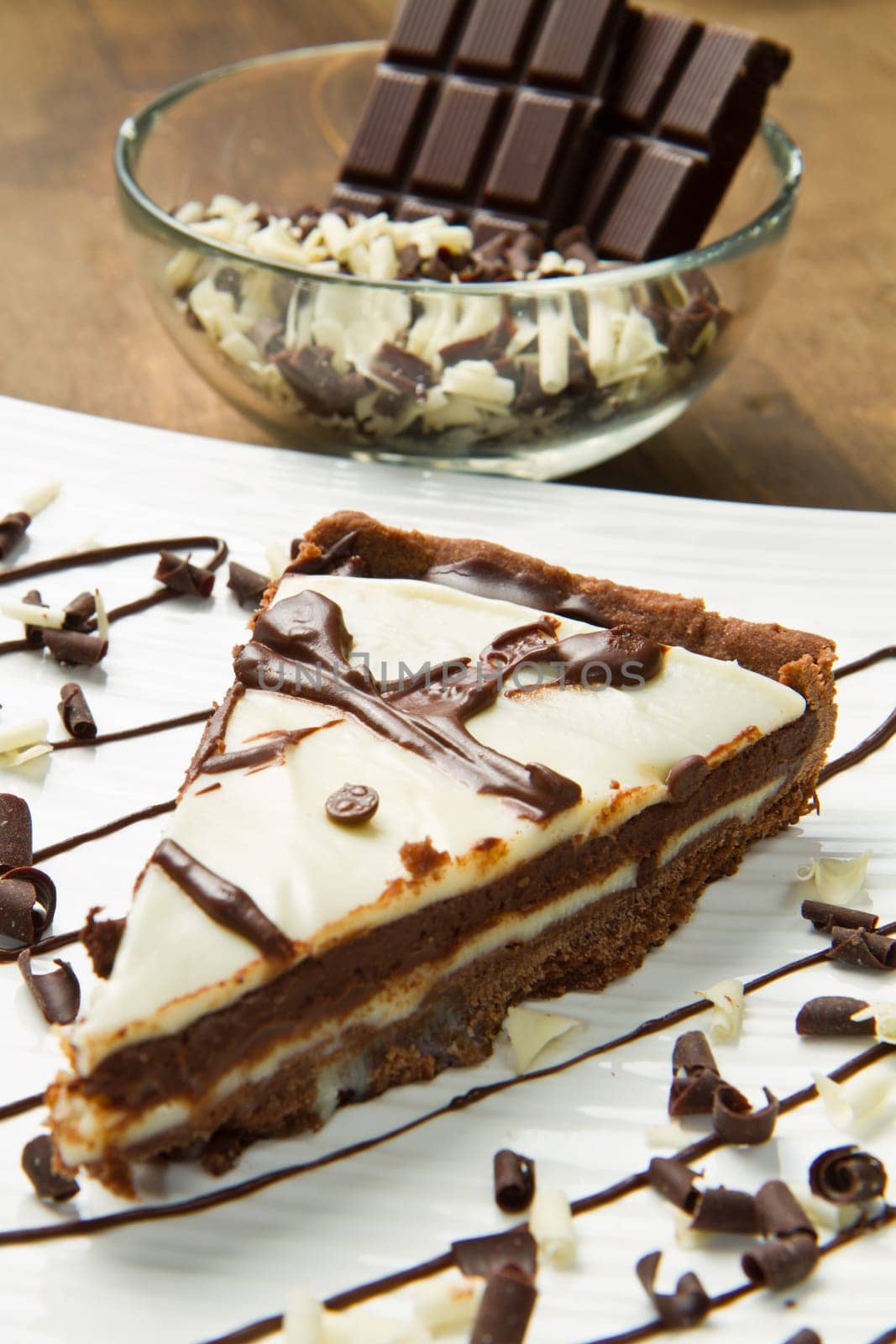 white dish with chocolate cake