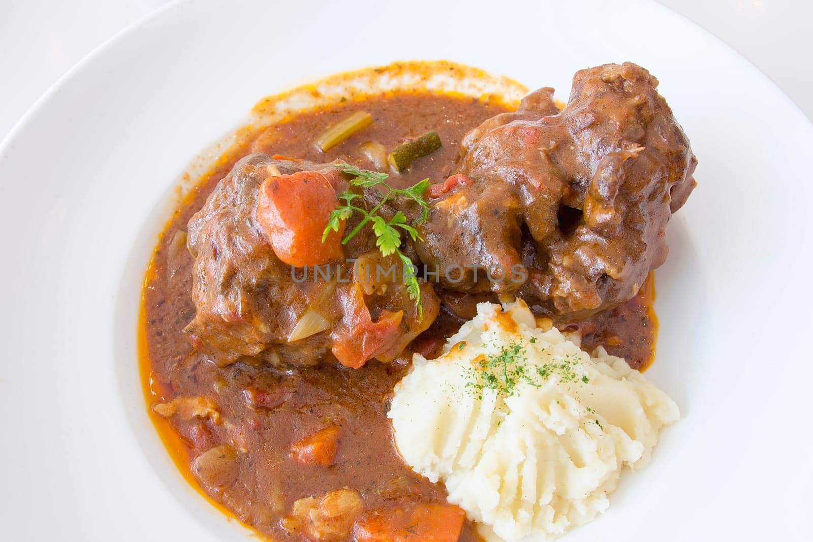 Ox Tail Beef Stew with Mashed Potatoes Dish Closeup
