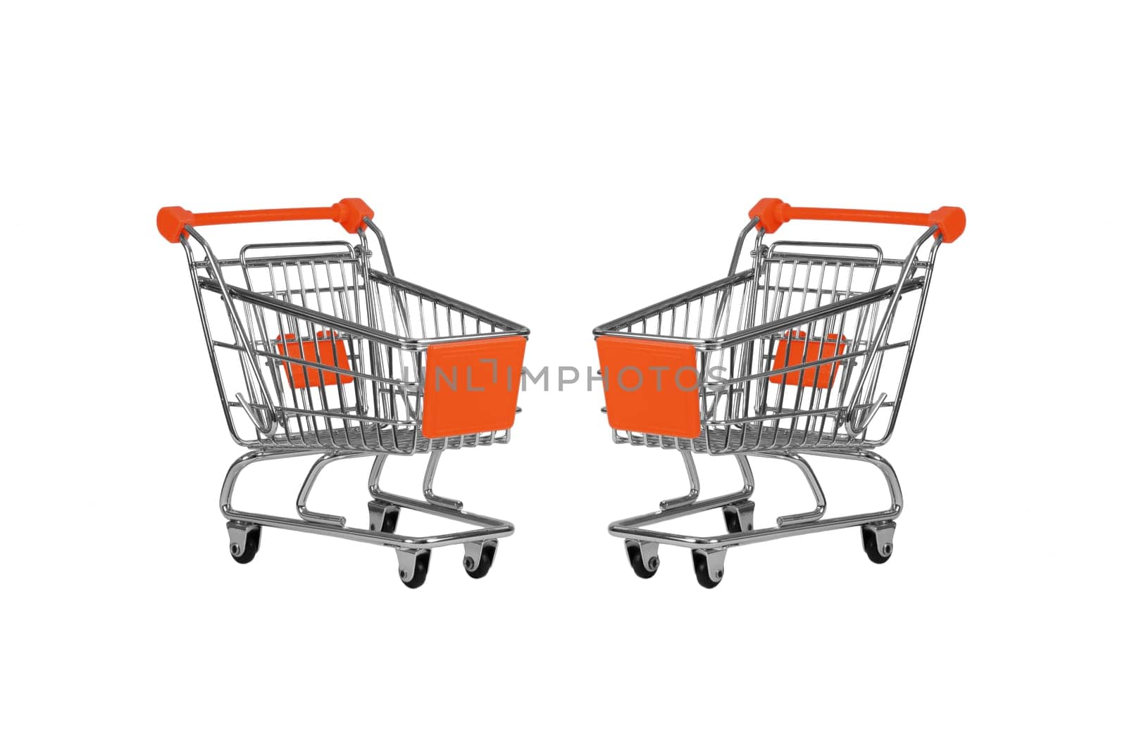 Two shopping carts observing isolated over white