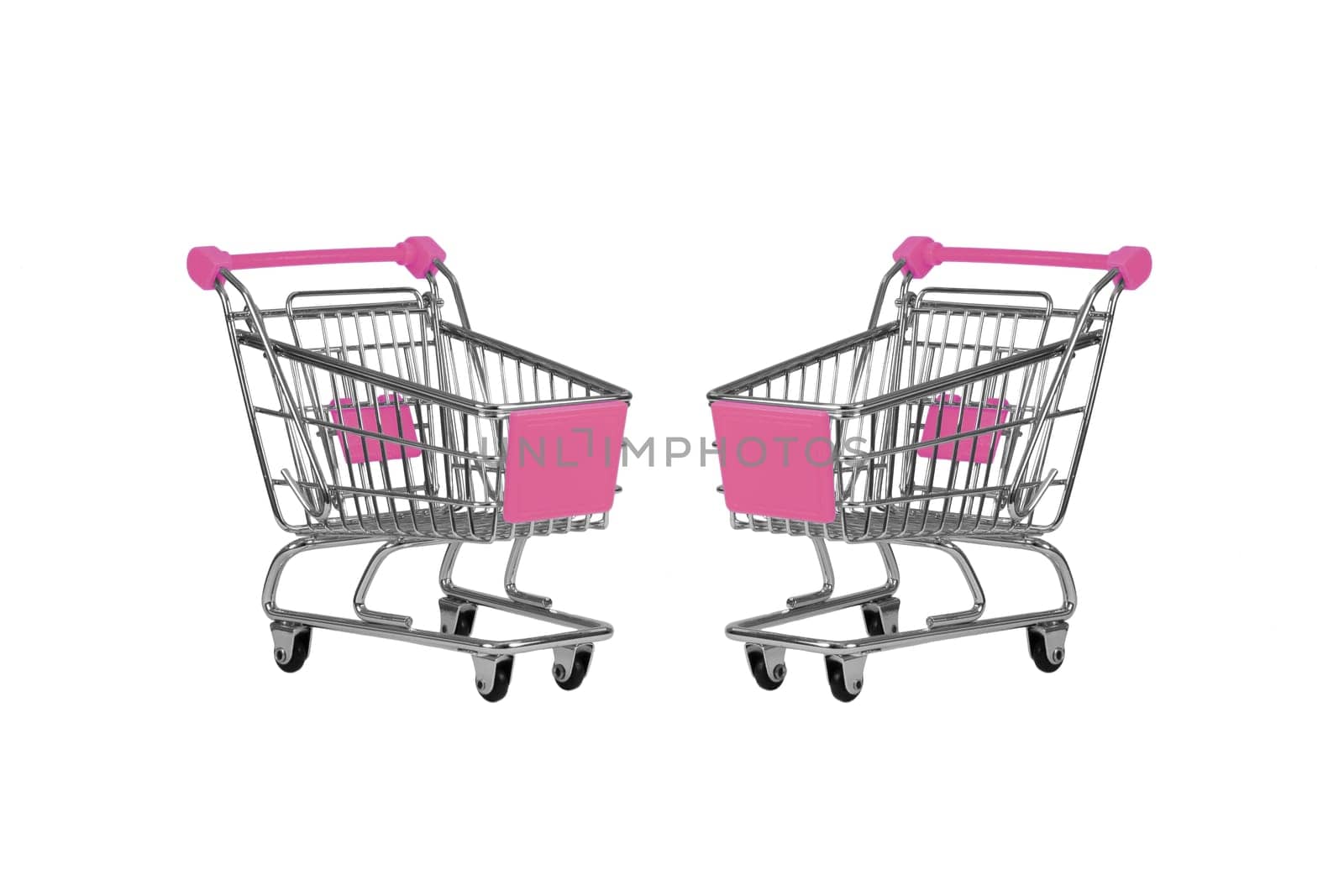 Two shopping carts observing isolated over white