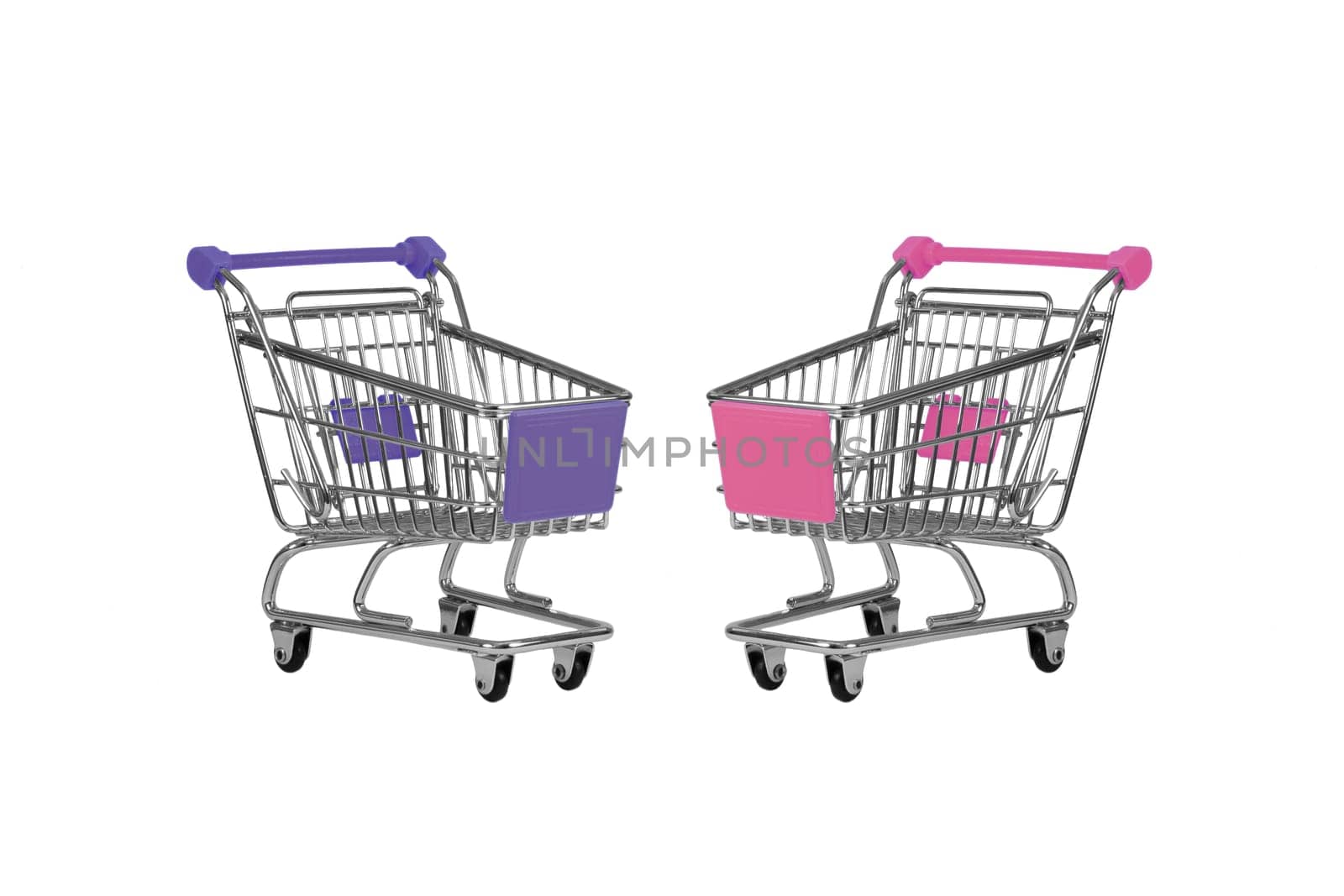 Two shopping carts observing isolated over white