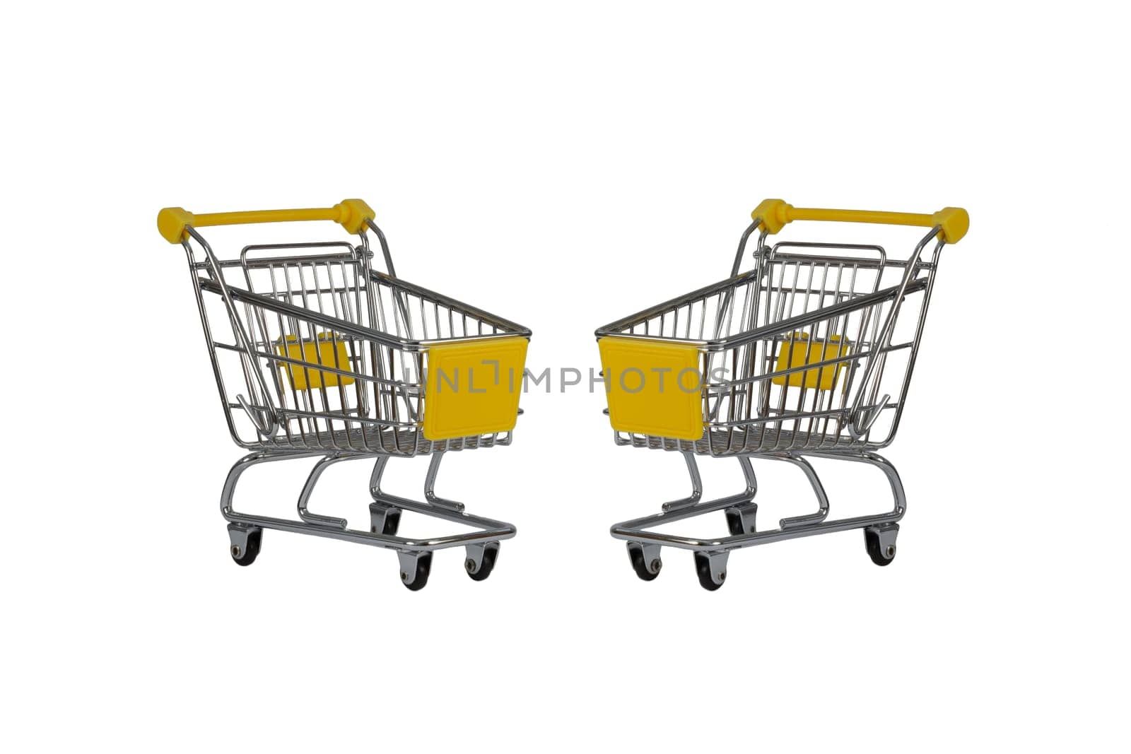 Two shopping carts observing isolated over white
