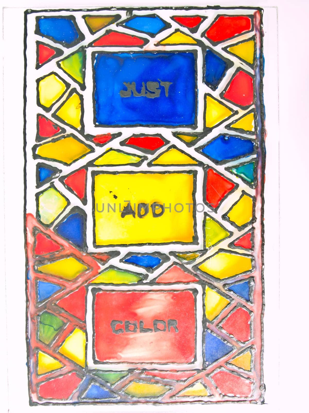A handmade multicolored stained glass isolated on white background