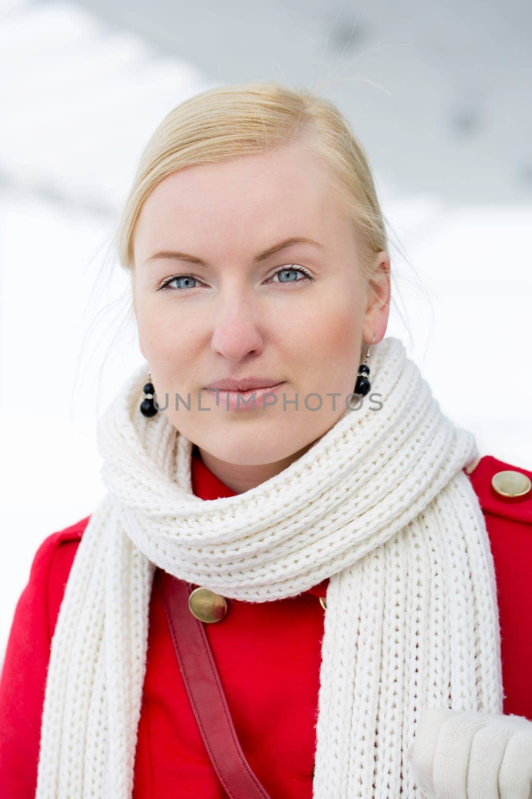 Young grey eyed woman looking straight on camera