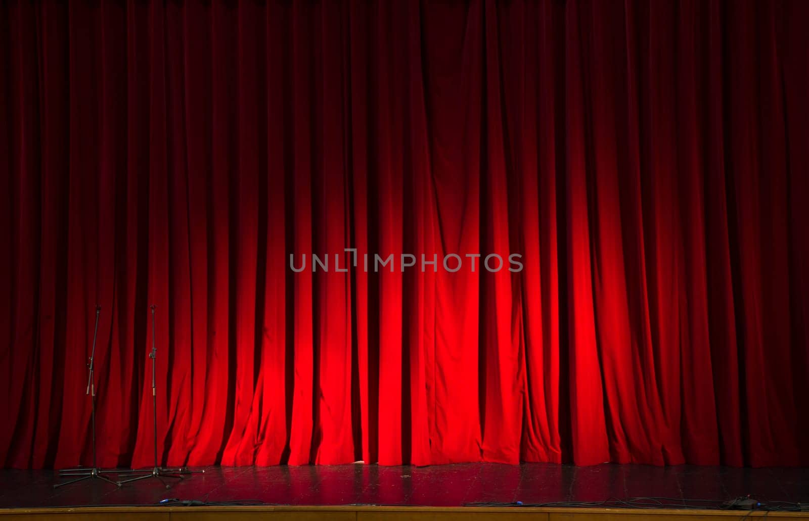 Red stage curtain hide coming show action preparations