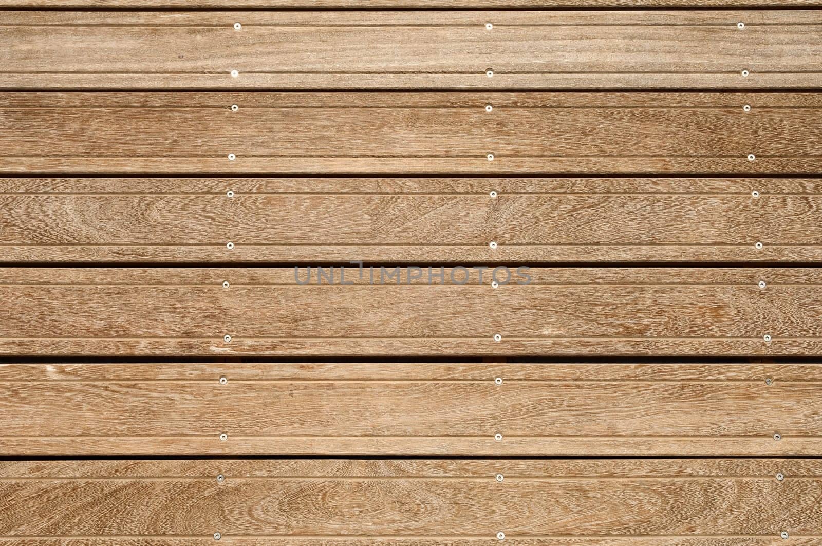 Hardwood pavement assembled with stainless steel screws