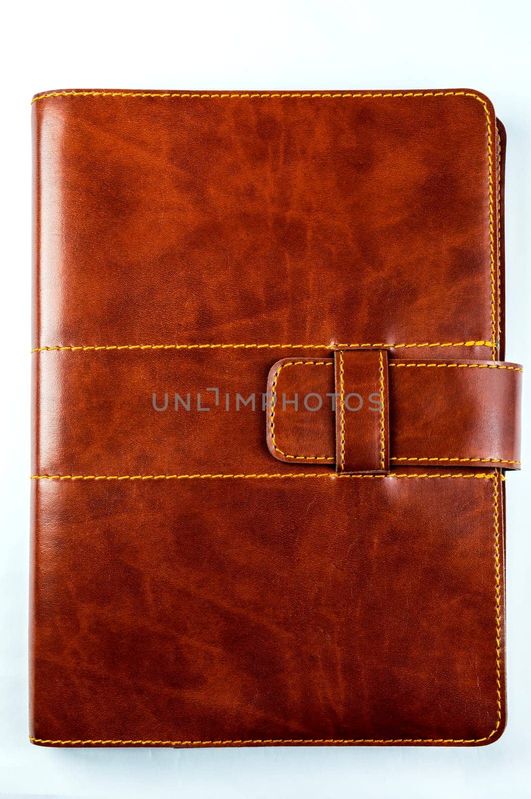 leather, brown notebook on white background