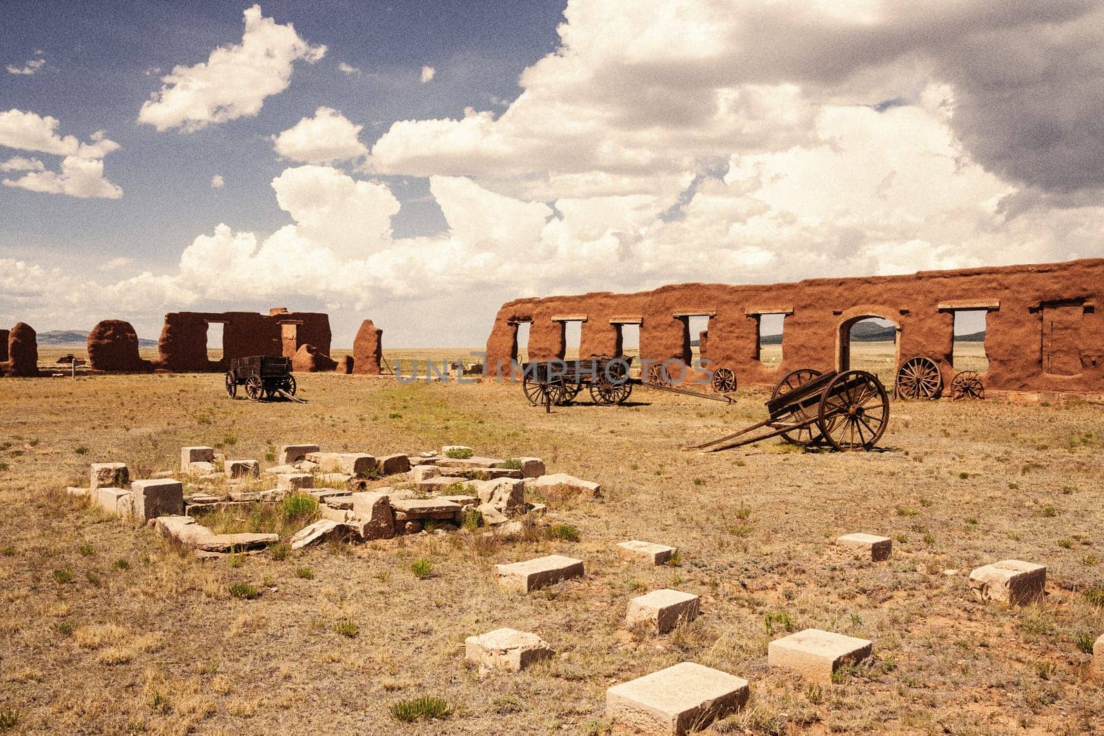 Vintage looking old picture of ruins and wagons at Fort Union