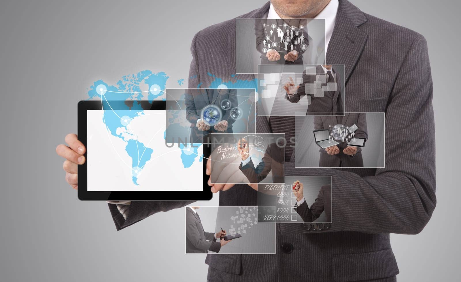 business man holding a tablet, grey background
