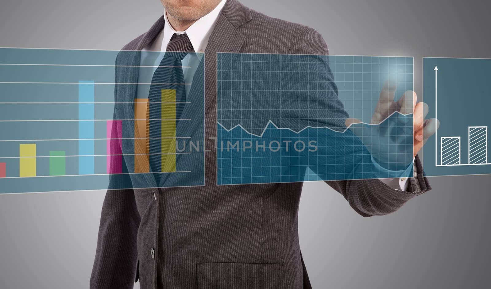 business man touching graphs on screen, grey background