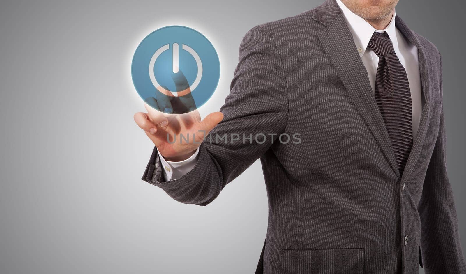 business man hand tapping on power button