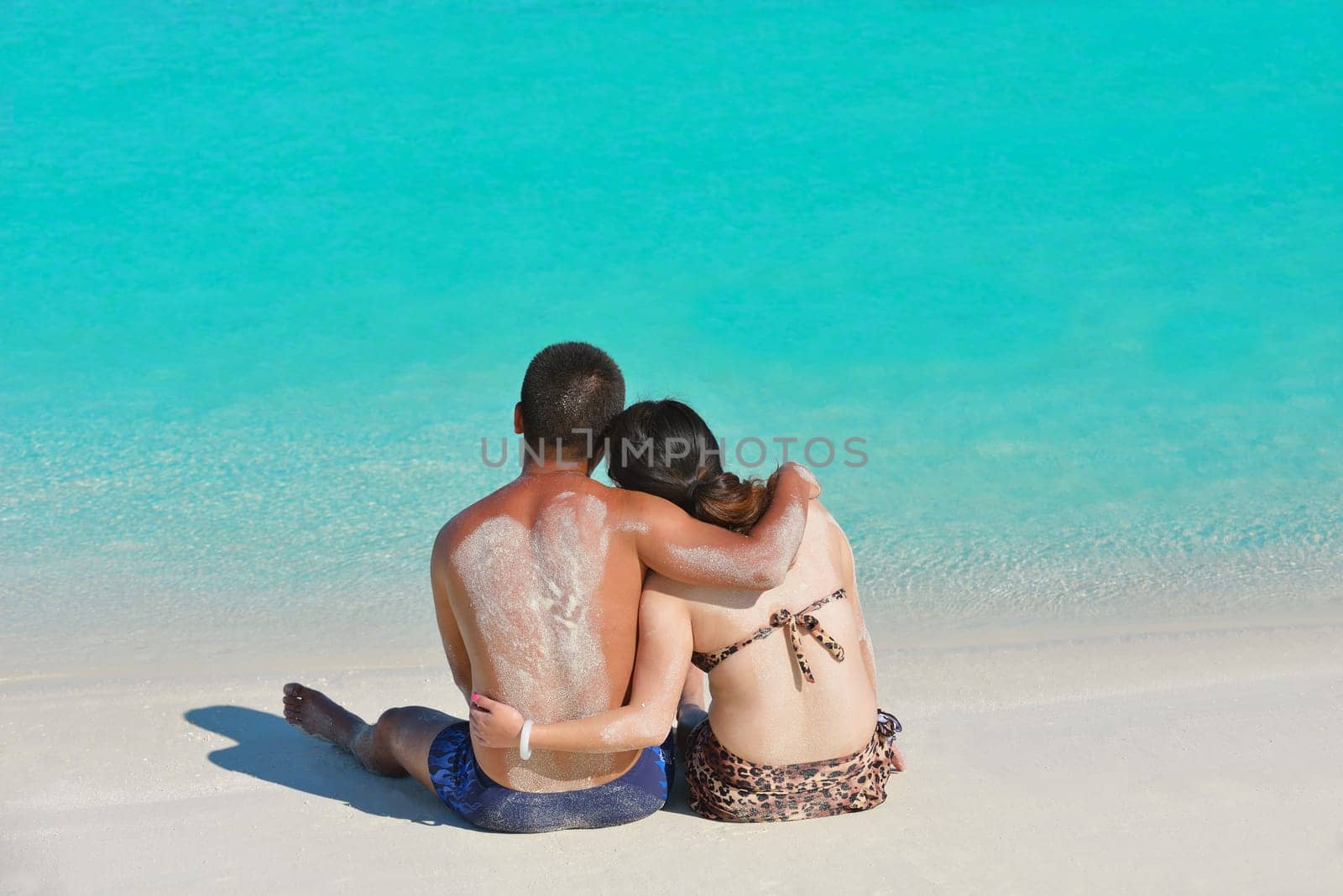 happy young asian couple have fun and romantic time at  summer on beautiful white sand beach