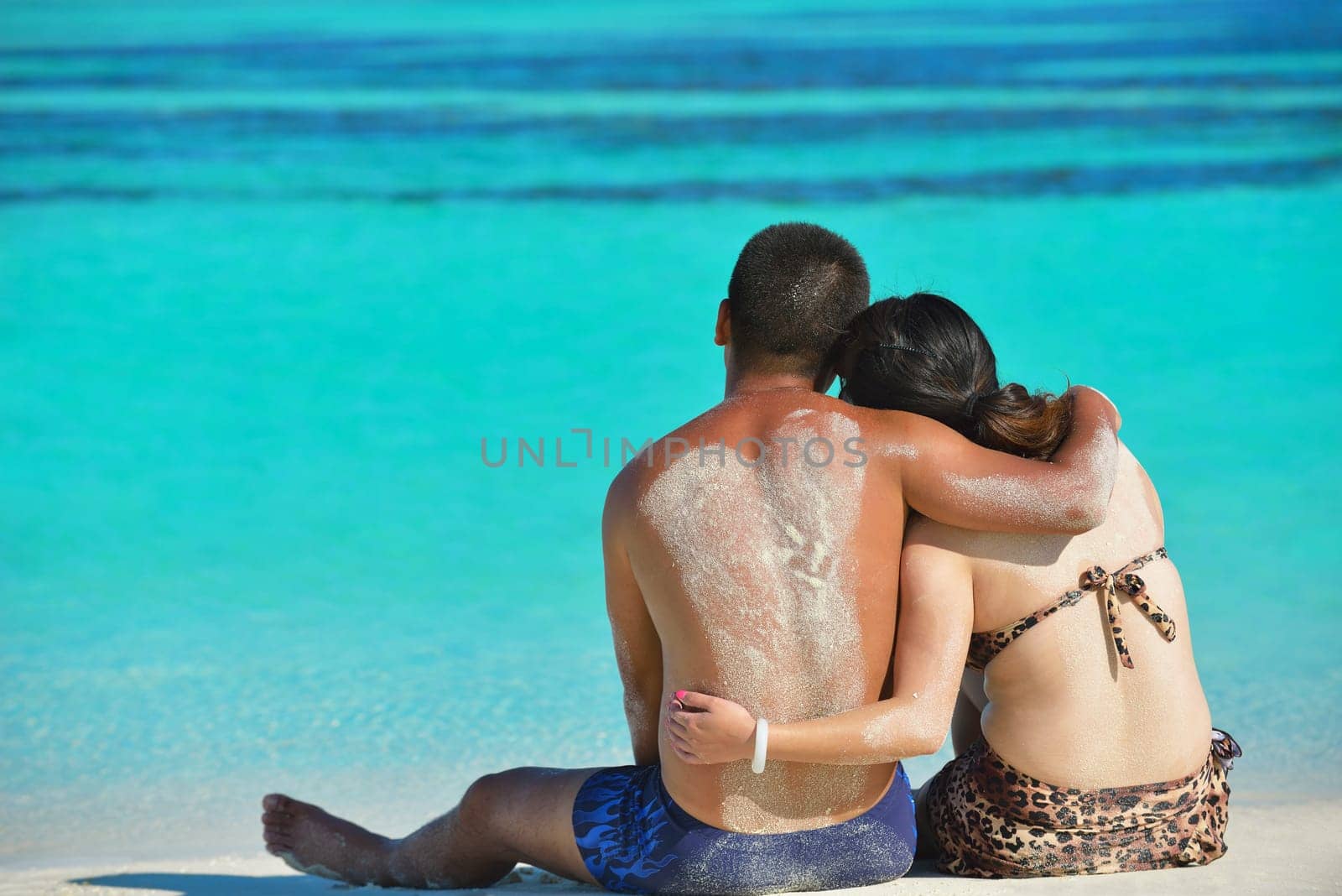 happy young asian couple have fun and romantic time at  summer on beautiful white sand beach