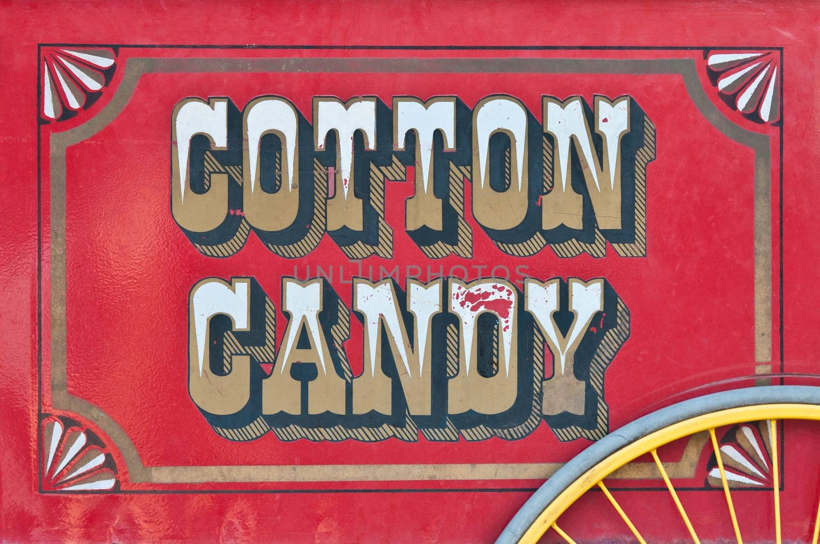 Side view of cotton candy sweets cart, red color, vintage look.