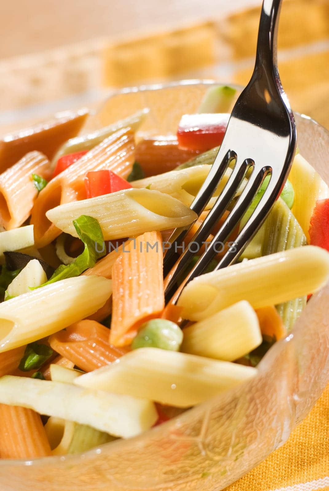 fresh colorful pasta in a bowl close up