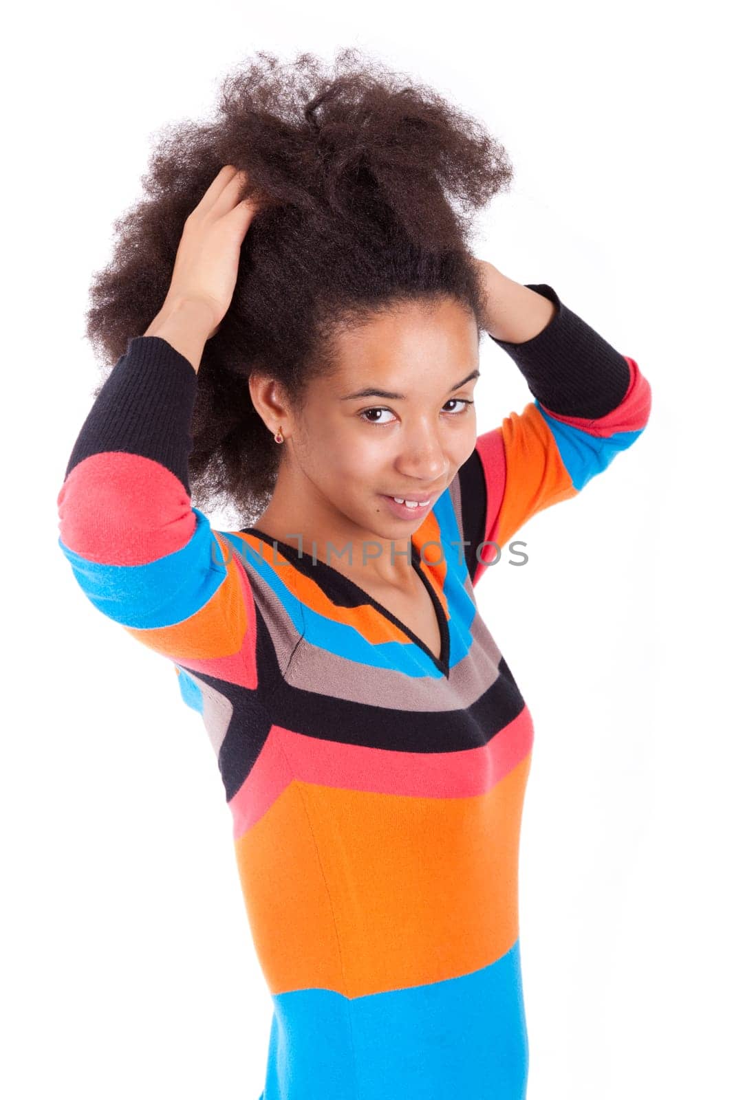 Black African American teenage girl holding her afro hair, isolated on white background