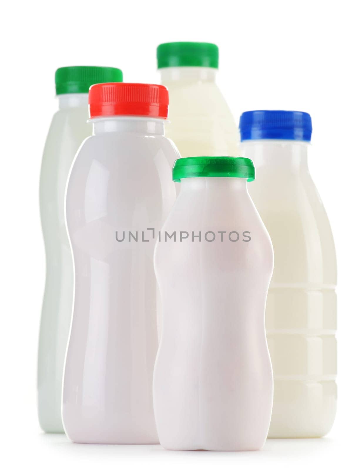 Composition with plastic bottles of milk products