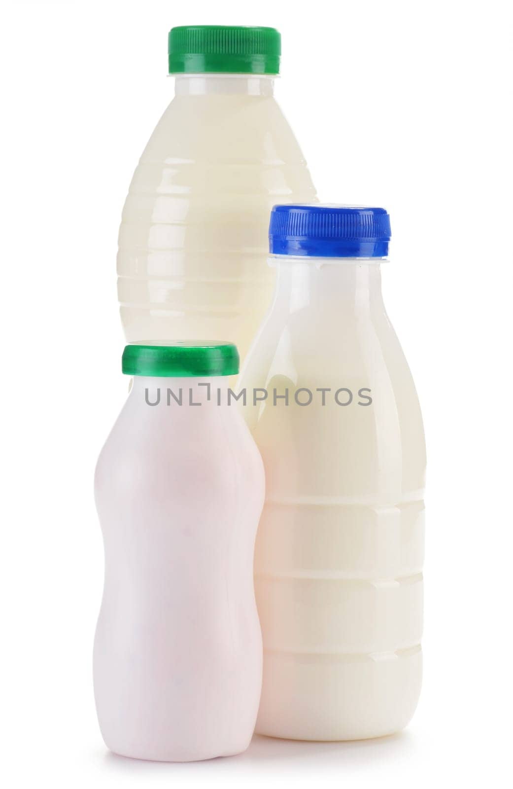 Composition with plastic bottles of milk products