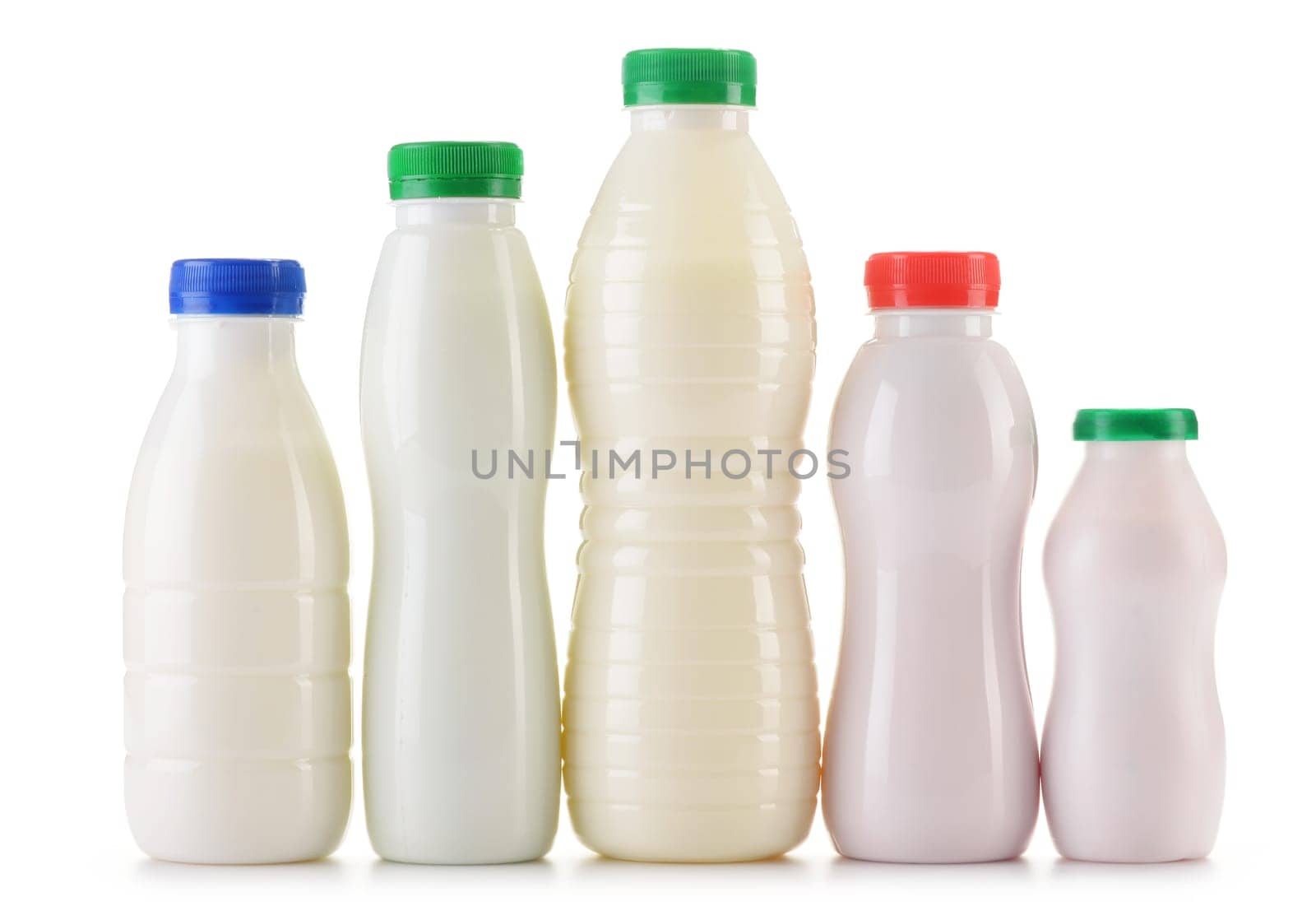 Composition with plastic bottles of milk products