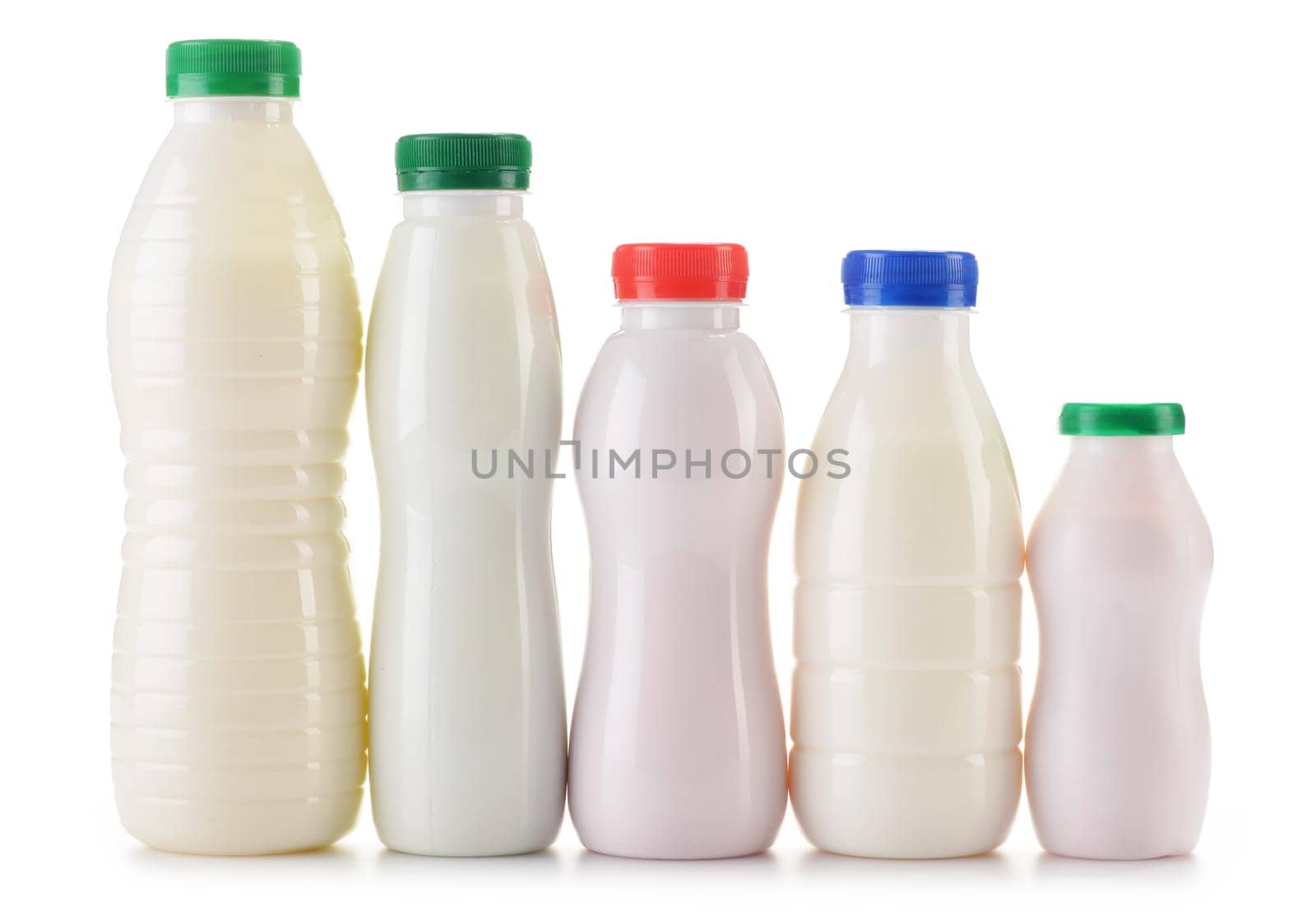 Composition with plastic bottles of milk products