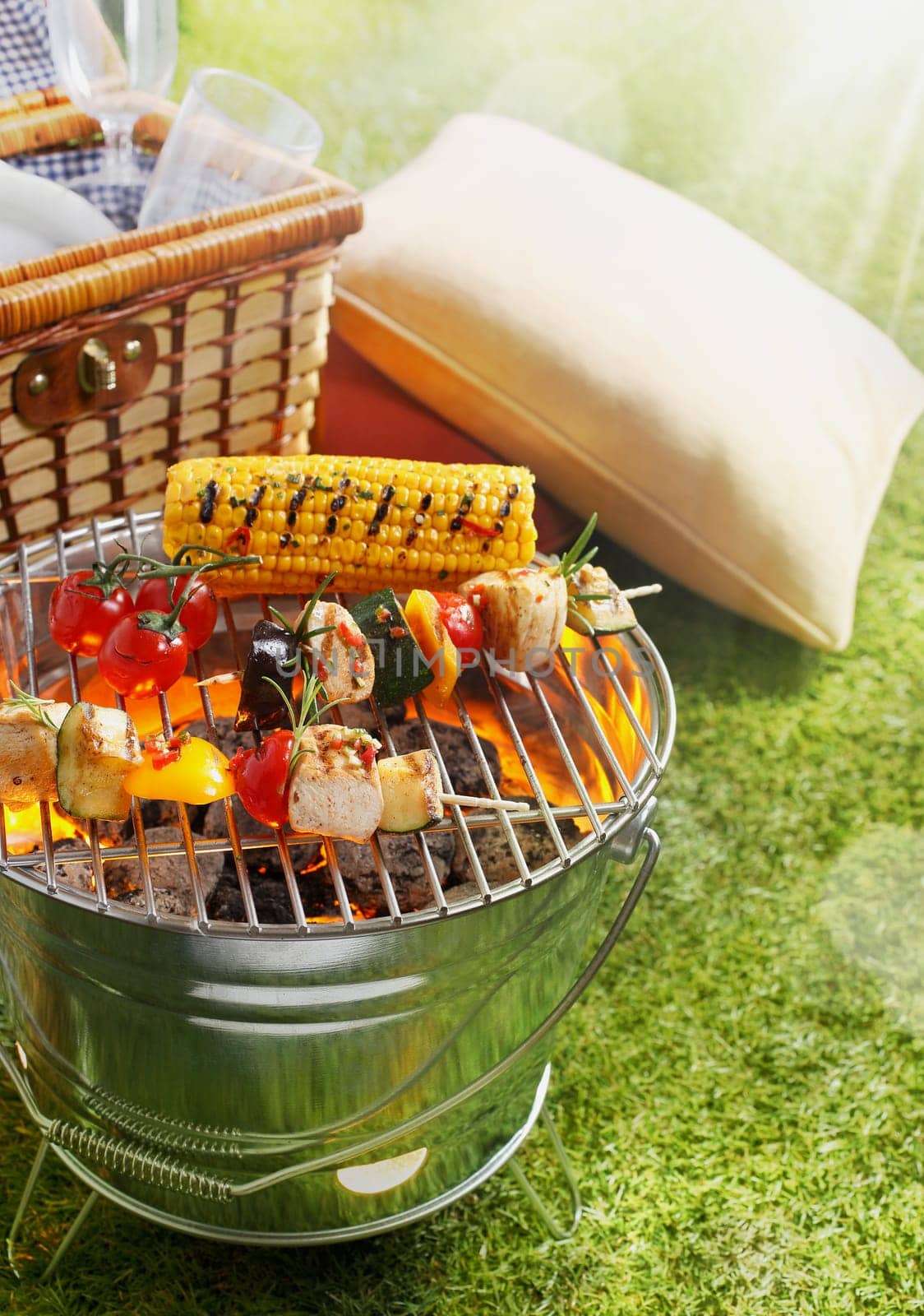 Aerial shot of En brochette and Corn Cob on a grilling pan