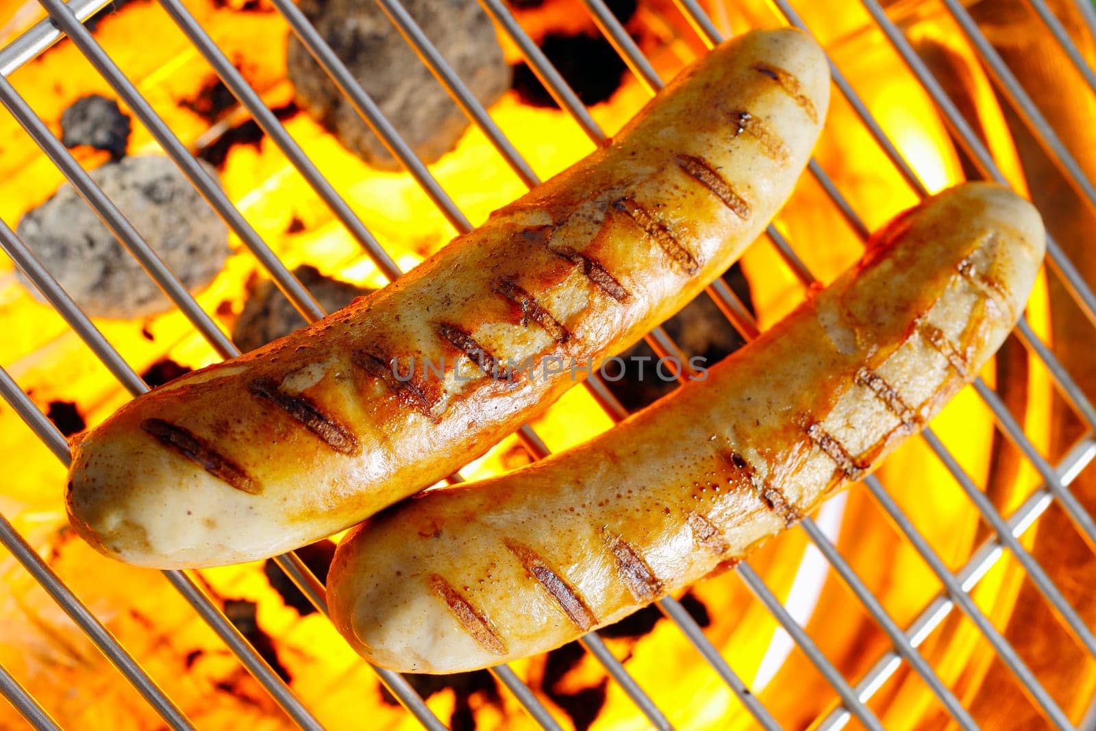 Top view shot of bratwurst on the grilling pan