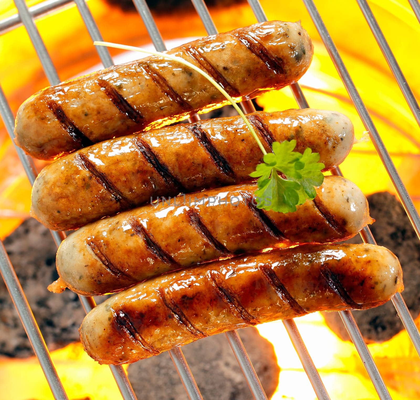 Helalthy smokies on barbecue with Open Flames