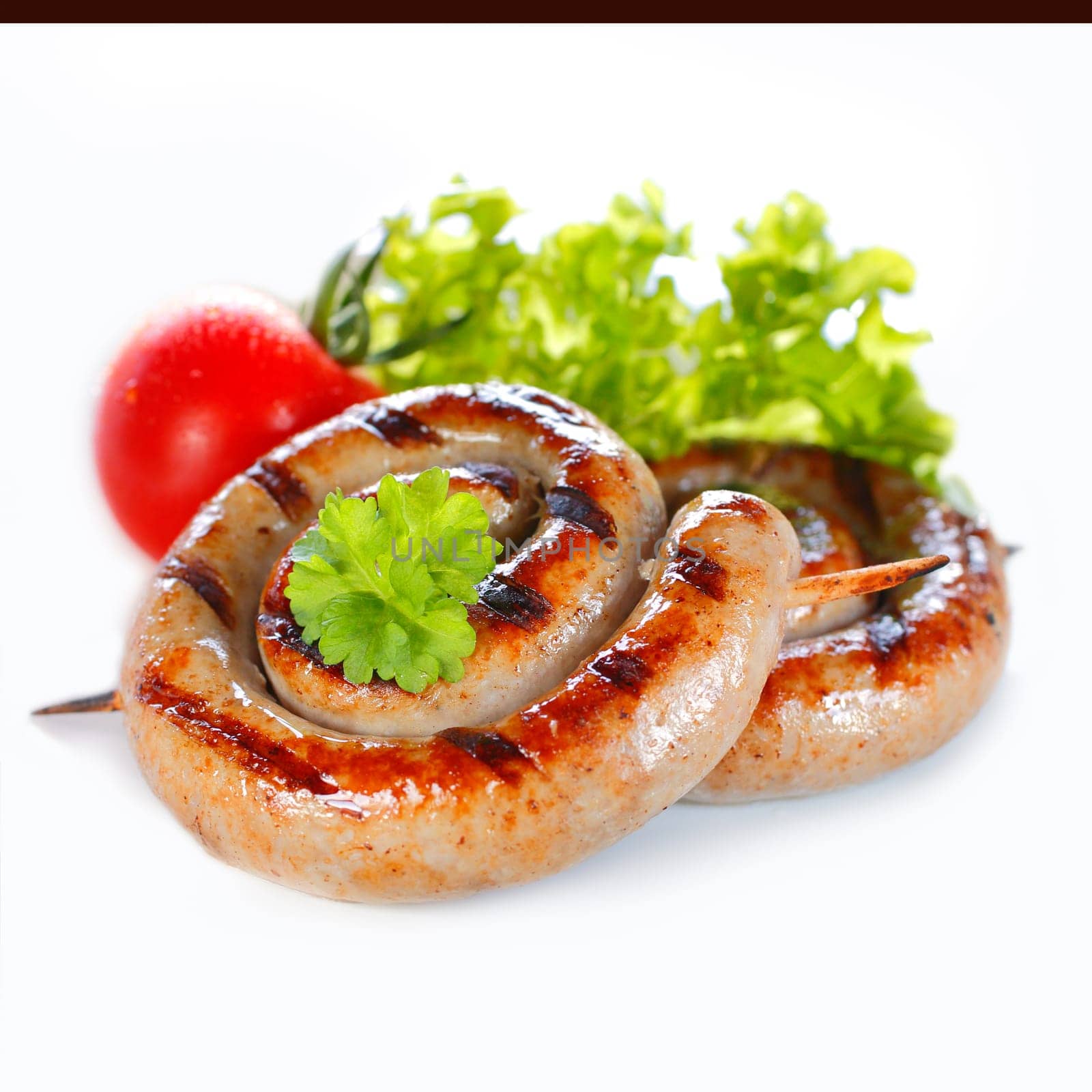 Rolled Italian Sausage on stick in a close up image