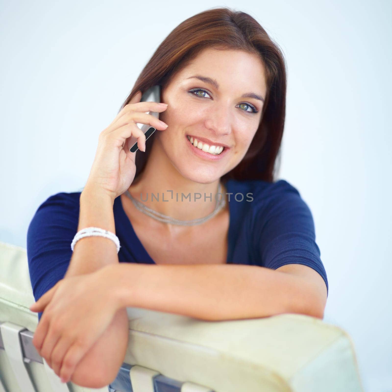 Happy woman, portrait and phone call talking in relax for conversation, communication or networking at home. Attractive female person smile and speaking on mobile smartphone for discussion at house by YuriArcurs