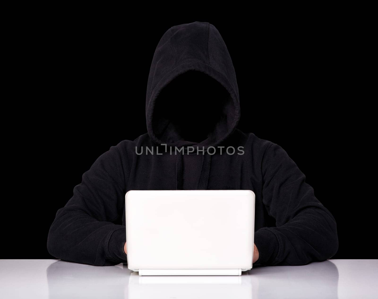 portrait of hacker isolated on black background