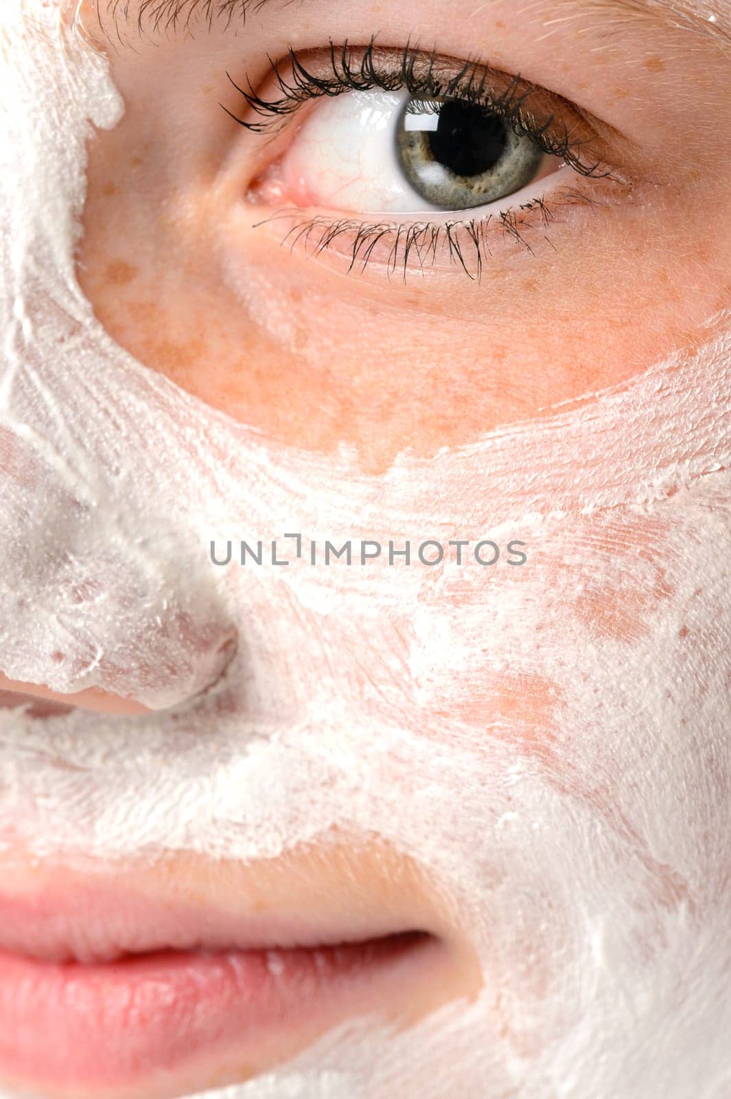 Smiling girl moisturizer facial face white mask eye
