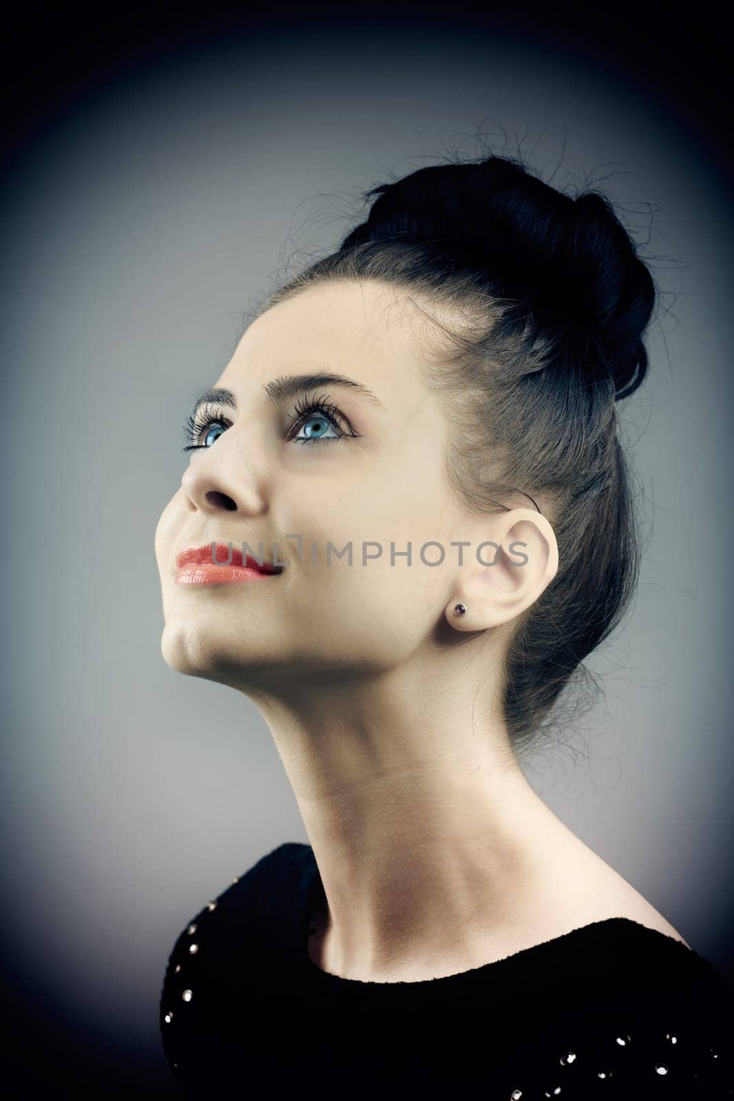 Portrait of a beautiful young woman, vintage feel.