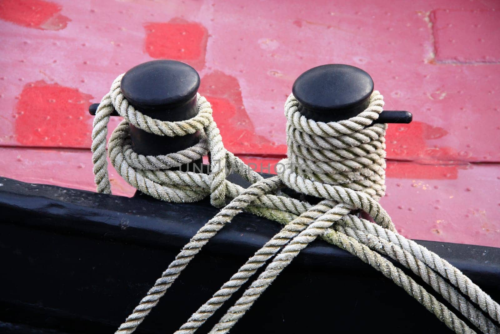 Ropes on the double bollard of a ship