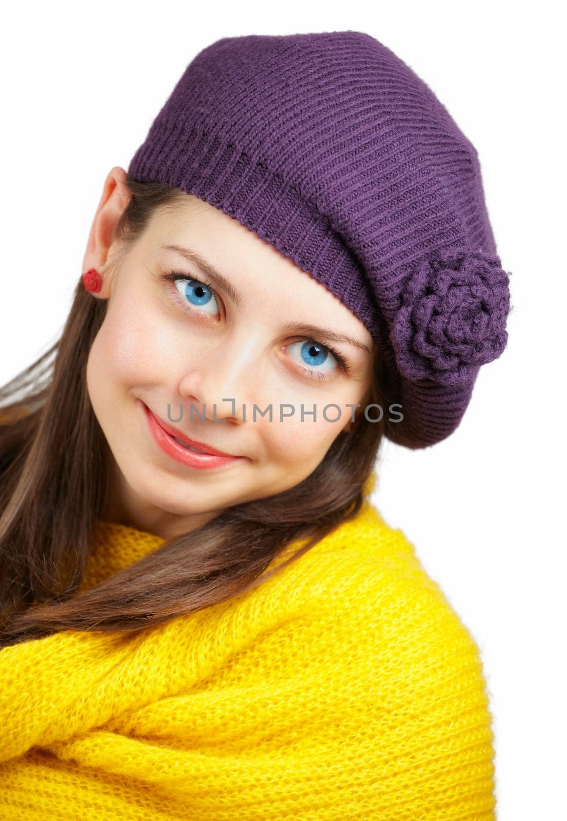 Portrait of a beautiful young woman with yellow scarf over white
