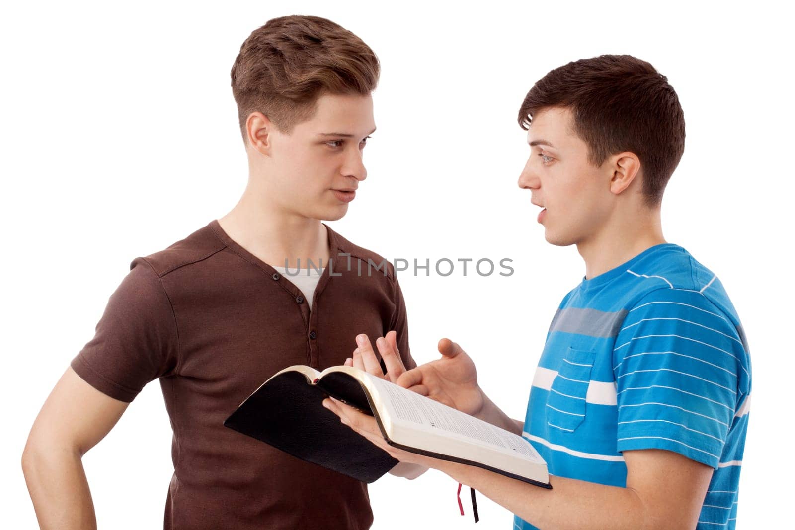 Young man explains God's Word to his friend