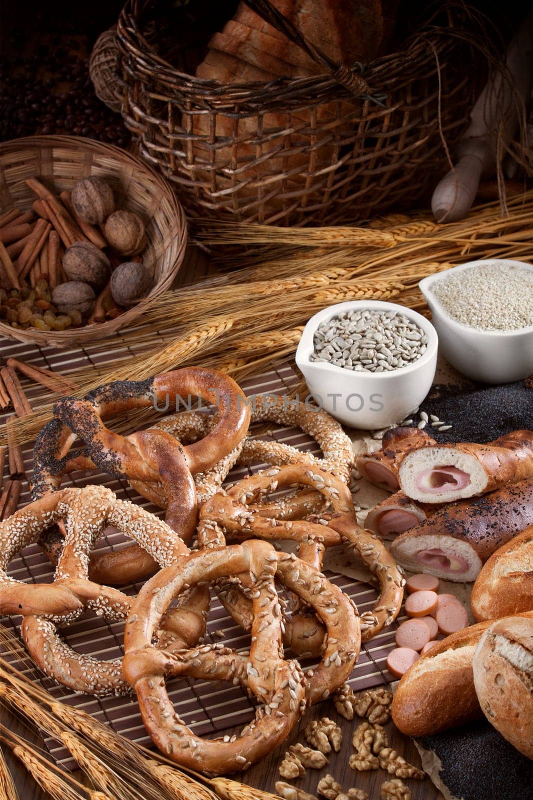 Group of different bakery products and seeds on the vertical