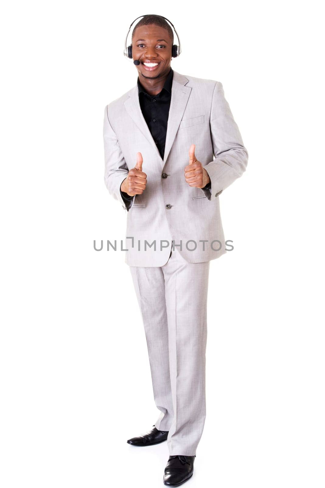Charming customer service representative with headset on gesturing thumbs up.
