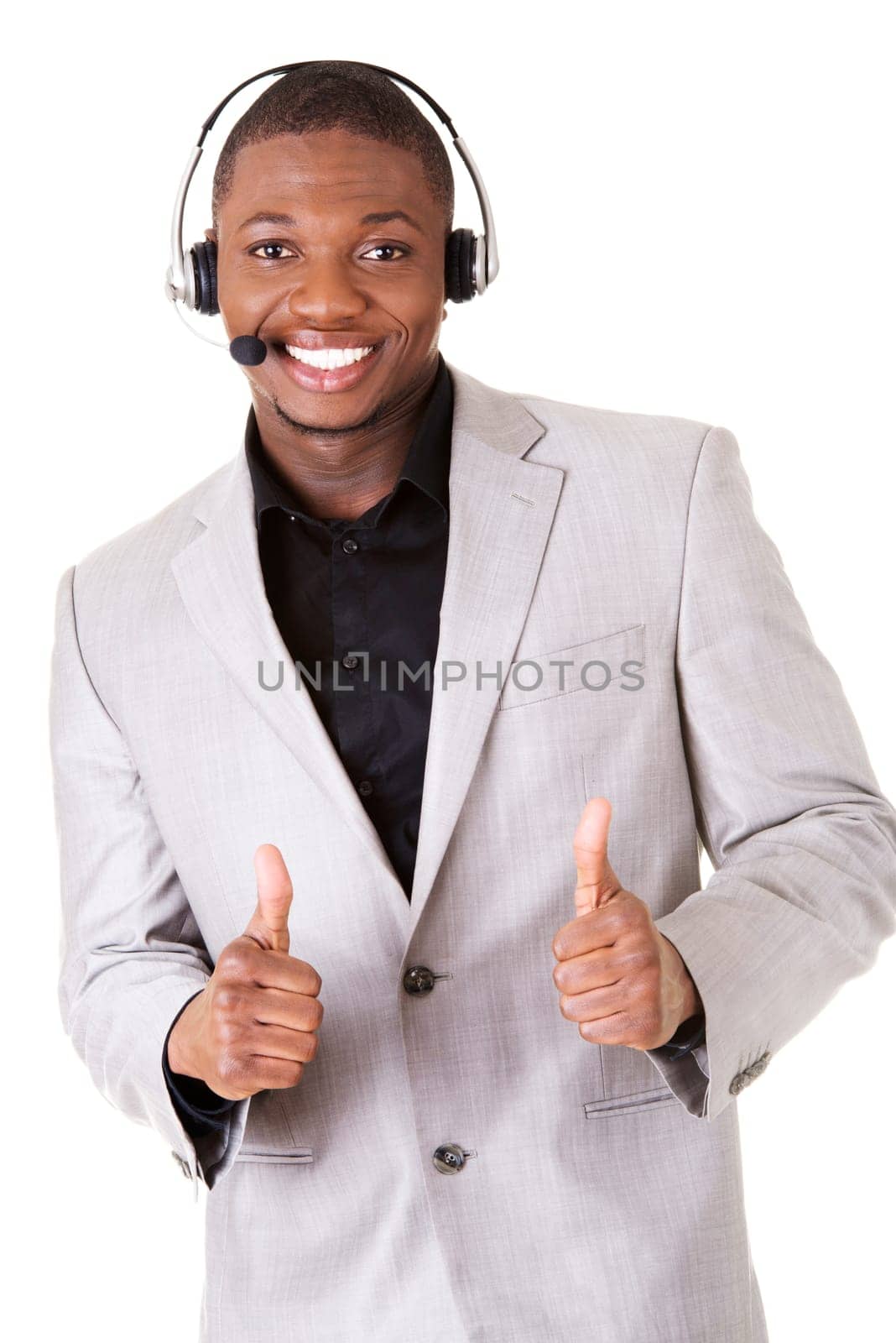 Charming customer service representative with headset on gesturing thumbs up.