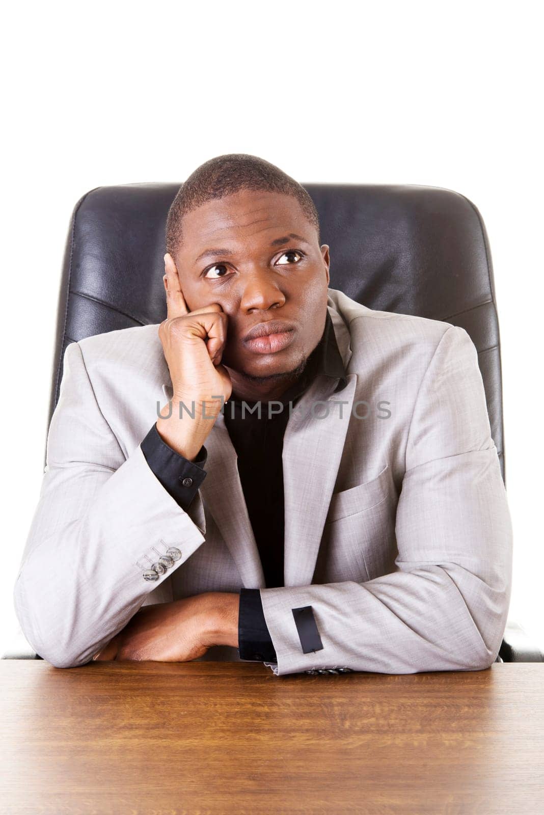Thoughtful businessman at the desk