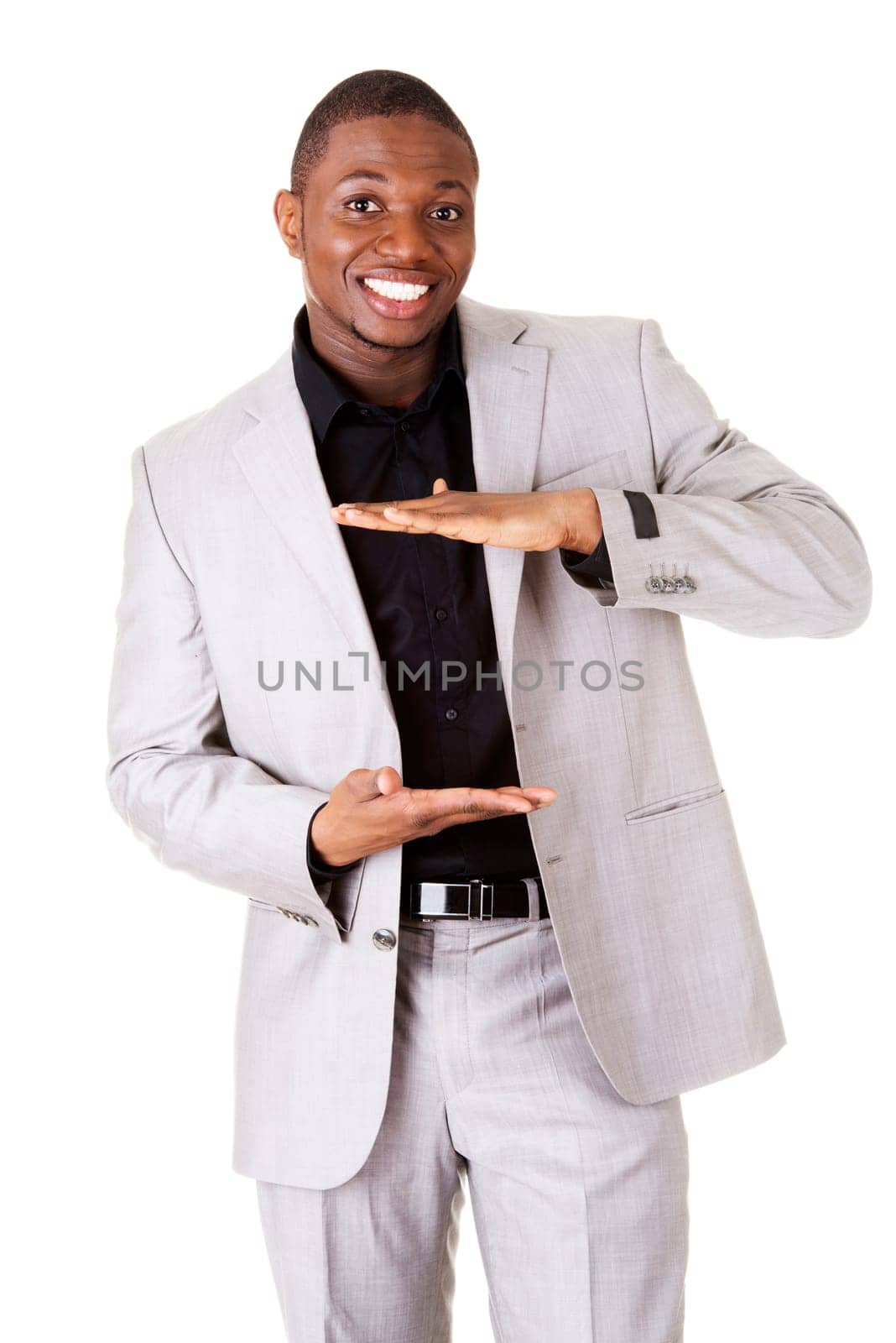 Businessman presenting something on his palm, isolated on white
