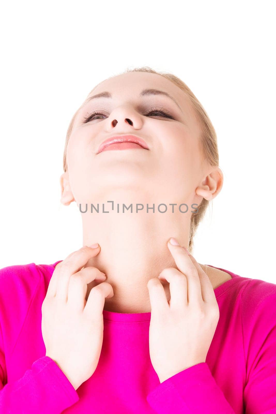 Young beautiful woman scratching her self. Isolated on white