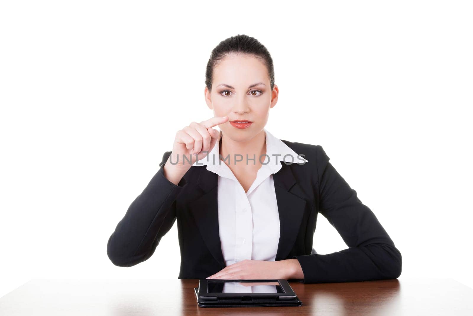 Businesswoman working on tablet computer with touch pad. Isolated on white.