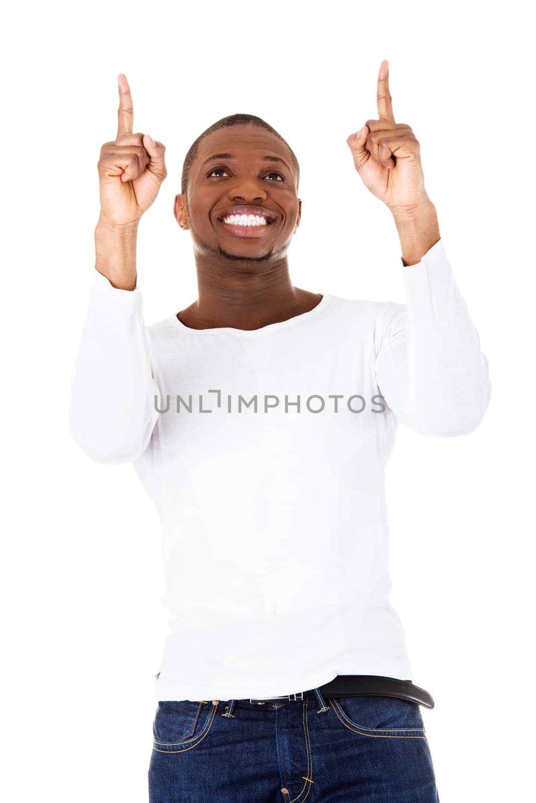 Happy young man pointing at something interesting over white background