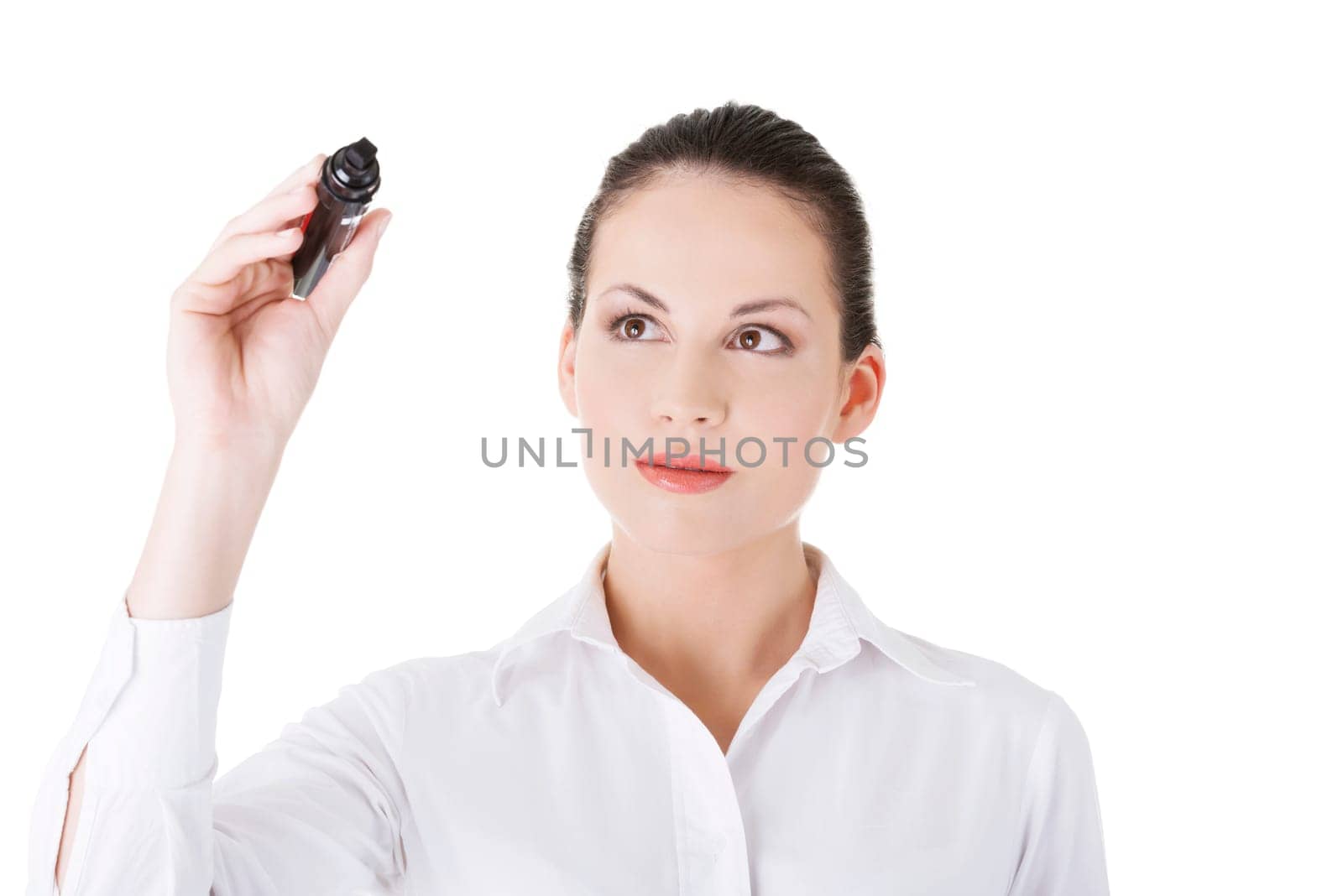 Young businesswoman writing something on abstract screen